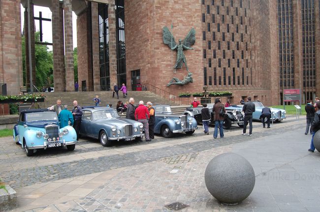 Alvis cars in front of Coventry Cathedral