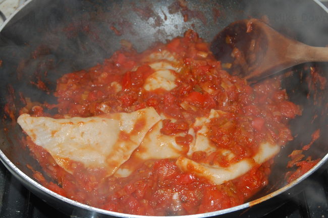 Kreplach in red pepper sauce